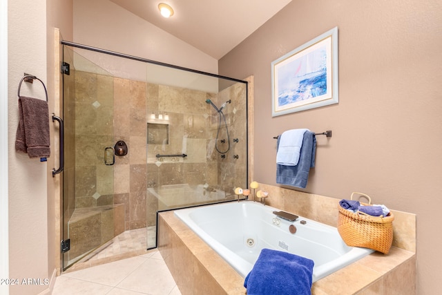 bathroom featuring vaulted ceiling, tile patterned flooring, and plus walk in shower