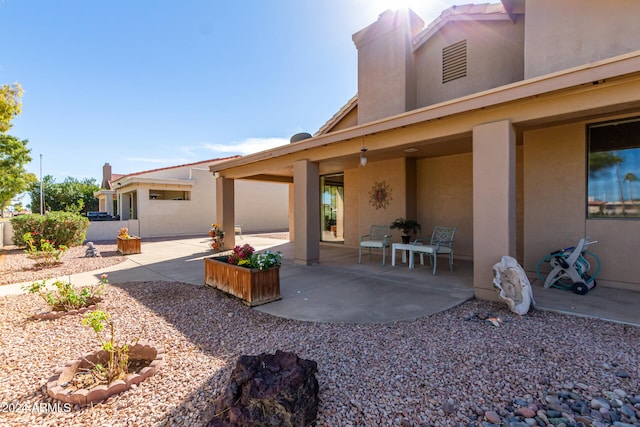 rear view of house with a patio area