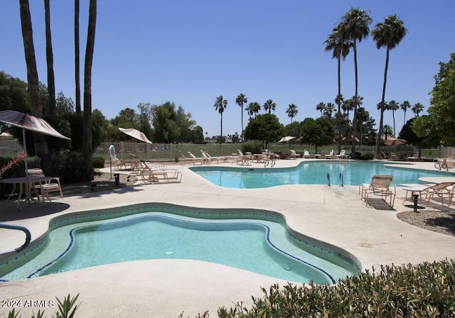 view of swimming pool featuring a patio