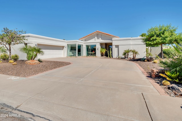 view of front of property featuring a garage