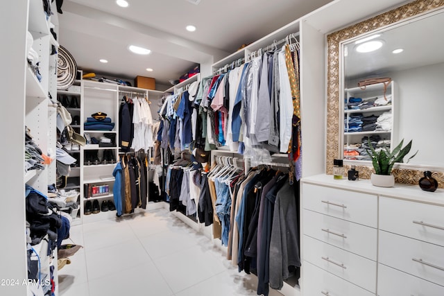 spacious closet with light tile patterned flooring