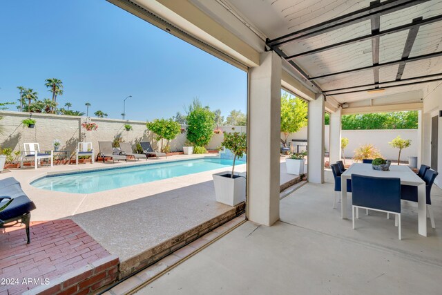 view of patio / terrace featuring area for grilling and an outdoor hangout area