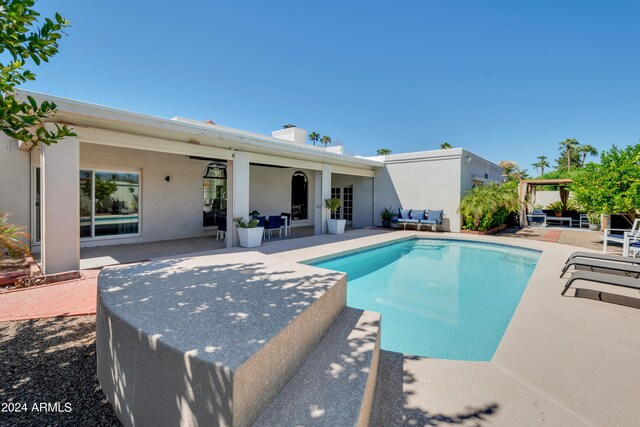 view of pool featuring a patio area