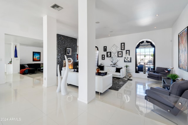 living room with light tile patterned flooring