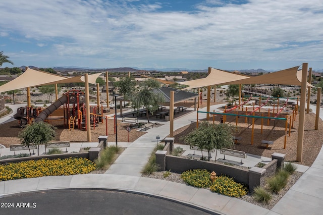 view of property's community with a playground