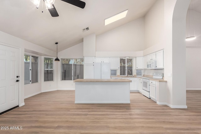 1405 N Jamaica Way, Gilbert, AZ 85234 - kitchen featuring white appliances, high vaulted ceiling, white cabinetry, light countertops, and a ceiling fan
