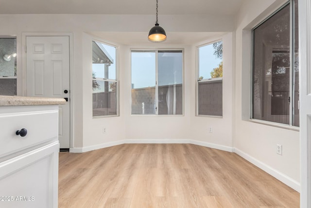 1405 N Jamaica Way, Gilbert, AZ 85234 - empty room featuring light wood-style floors and baseboards