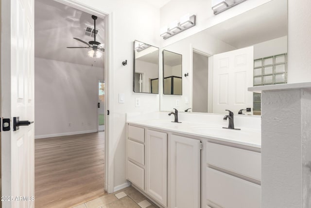 1405 N Jamaica Way, Gilbert, AZ 85234 - bathroom with a ceiling fan, double vanity, and tile patterned flooring