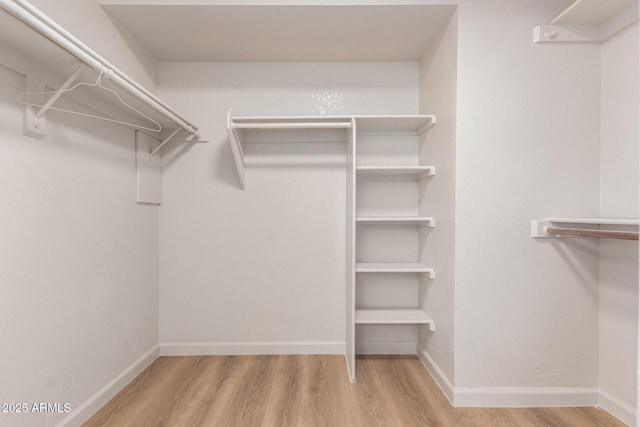 1405 N Jamaica Way, Gilbert, AZ 85234 - walk in closet featuring wood finished floors