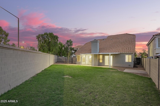 1405 N Jamaica Way, Gilbert, AZ 85234 - fenced backyard with a patio area
