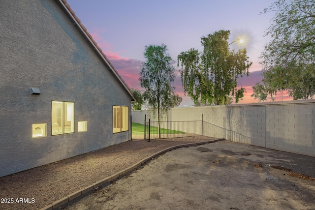 1405 N Jamaica Way, Gilbert, AZ 85234 - view of home's exterior featuring a fenced backyard and stucco siding