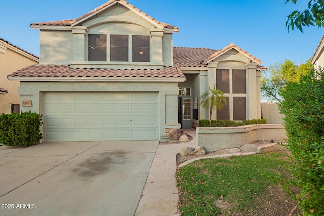 1405 N Jamaica Way, Gilbert, AZ 85234 - mediterranean / spanish home featuring a tiled roof, a garage, driveway, and stucco siding