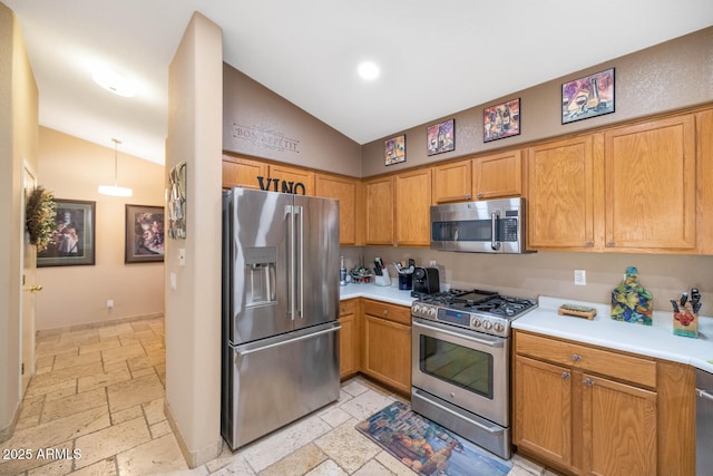 15740 N 91st Dr, Peoria, AZ 85382 - kitchen with appliances with stainless steel finishes, stone tile floors, light countertops, high vaulted ceiling, and brown cabinets