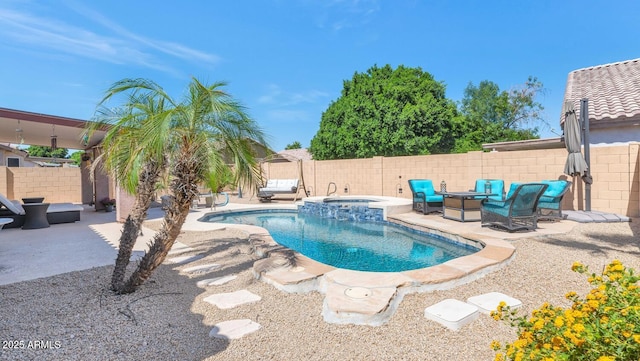 15740 N 91st Dr, Peoria, AZ 85382 - view of swimming pool featuring a patio area, a fenced backyard, and a pool with connected hot tub