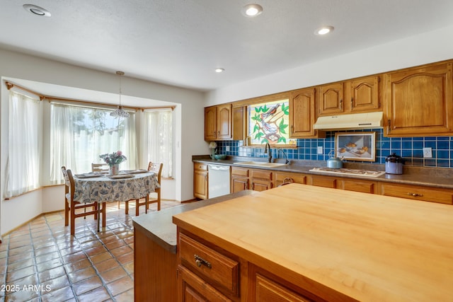7526 E Edgemont Ave, Scottsdale, AZ 85251 - kitchen featuring white appliances, under cabinet range hood, a sink, wood counters, and decorative backsplash