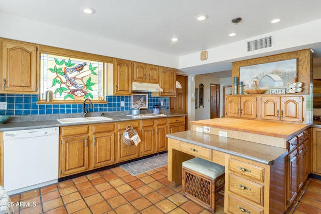 7526 E Edgemont Ave, Scottsdale, AZ 85251 - kitchen with white appliances, under cabinet range hood, a sink, decorative backsplash, and recessed lighting