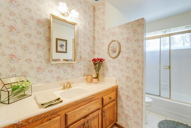 7526 E Edgemont Ave, Scottsdale, AZ 85251 - bathroom with vanity, tile patterned floors, enclosed tub / shower combo, and toilet