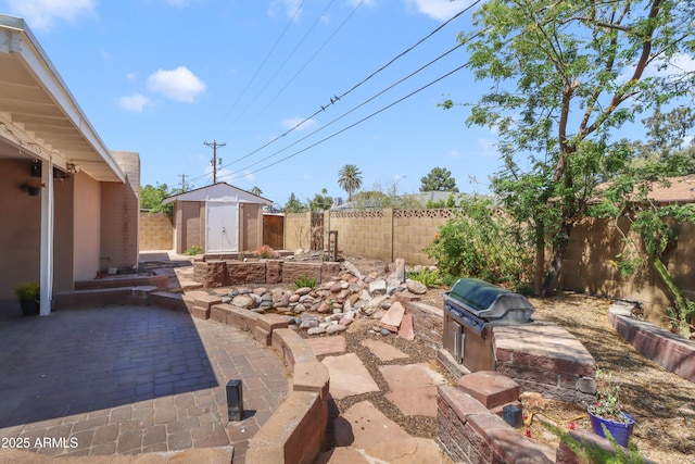 7526 E Edgemont Ave, Scottsdale, AZ 85251 - fenced backyard with a patio area and a grill