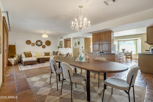 7526 E Edgemont Ave, Scottsdale, AZ 85251 - dining room featuring a chandelier