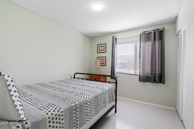 bedroom with a textured ceiling