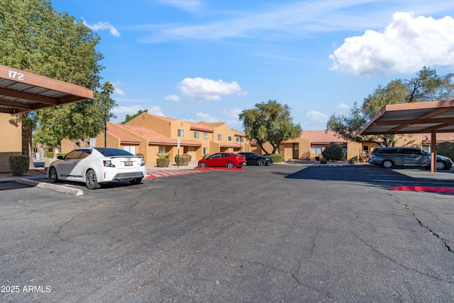 view of parking with a carport