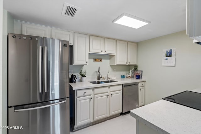 kitchen with appliances with stainless steel finishes and sink