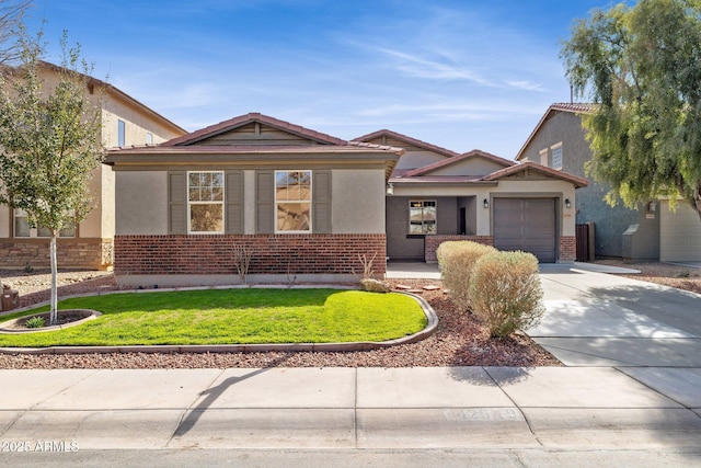 view of front of home with stucco siding, brick siding, a garage, and concrete driveway