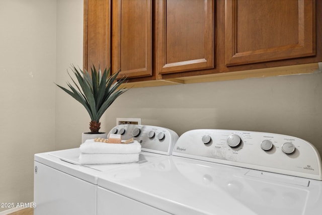 laundry room with independent washer and dryer