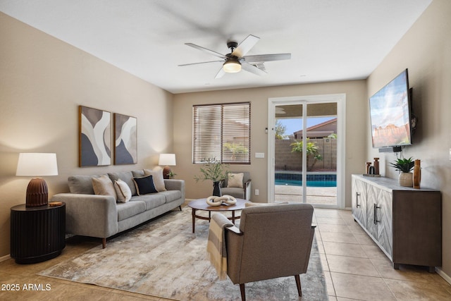 living room with light tile patterned flooring and ceiling fan