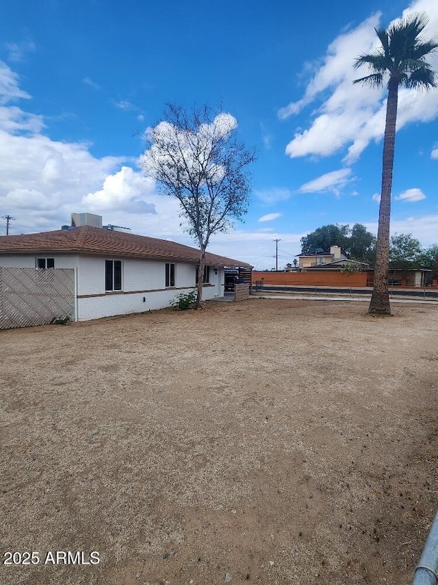 view of yard with fence