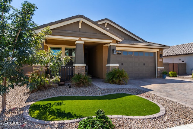 craftsman inspired home with a garage