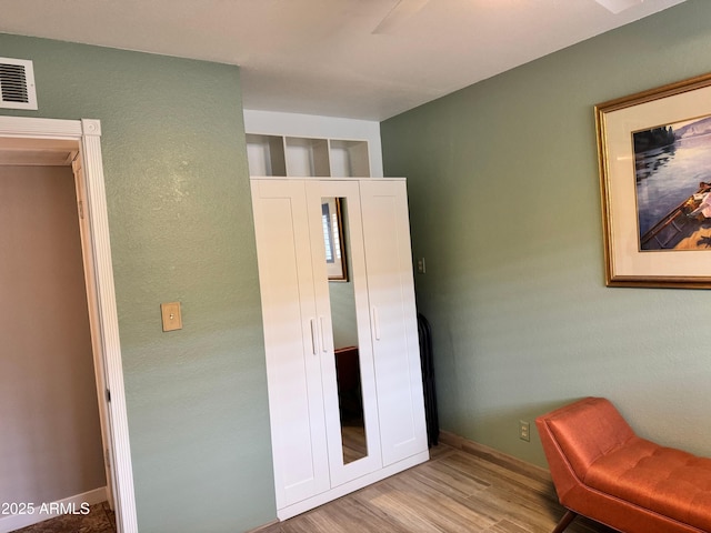 bedroom featuring light hardwood / wood-style floors