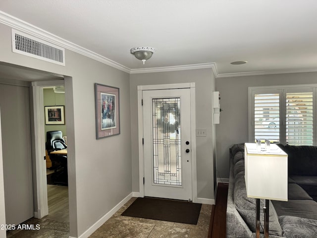 foyer entrance featuring ornamental molding