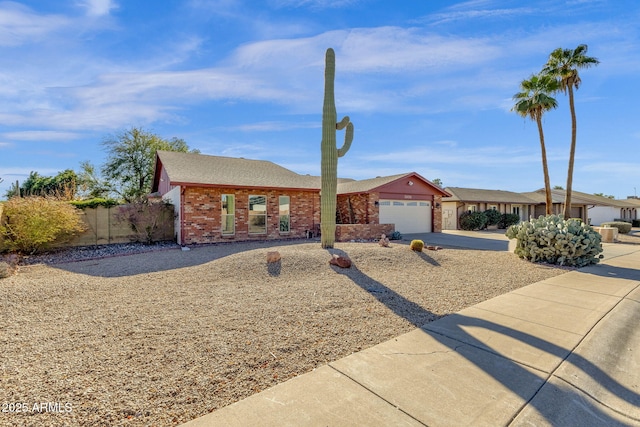 single story home with a garage