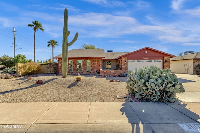 single story home featuring a garage