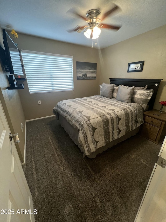 carpeted bedroom featuring a ceiling fan