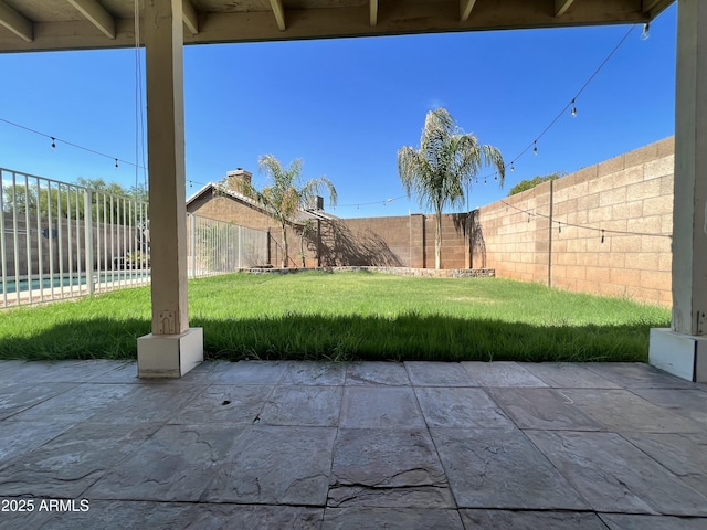 view of patio with a fenced backyard