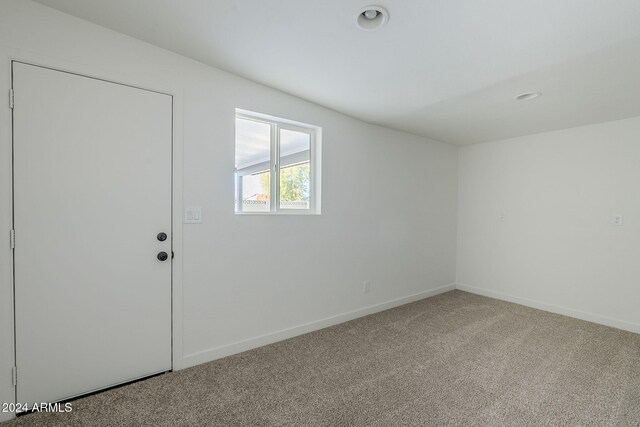 1436 E Downing St, Mesa, AZ 85203 - carpeted spare room featuring baseboards
