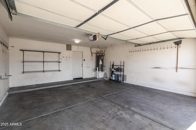 3713 W Nancy Ln, Phoenix, AZ 85041 - garage with electric water heater and a garage door opener