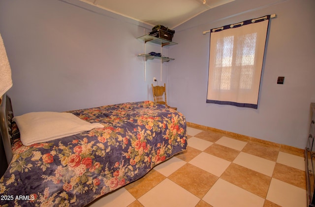 720 W Dewey Ave, Coolidge, AZ 85128 - bedroom featuring baseboards and tile patterned floors