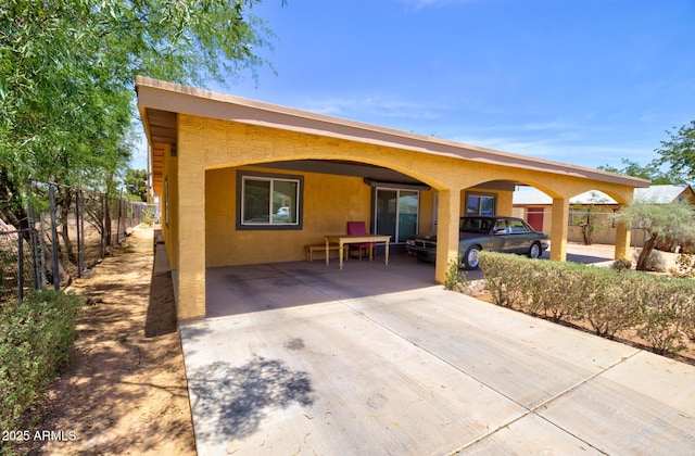 720 W Dewey Ave, Coolidge, AZ 85128 - rear view of house featuring stucco siding