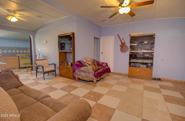 720 W Dewey Ave, Coolidge, AZ 85128 - living area featuring ceiling fan and arched walkways
