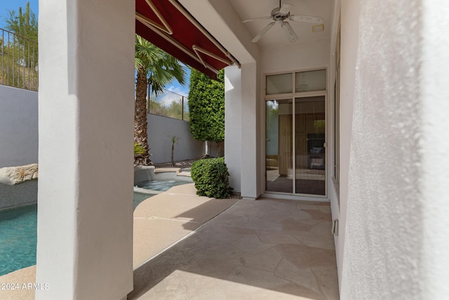 view of patio / terrace featuring ceiling fan