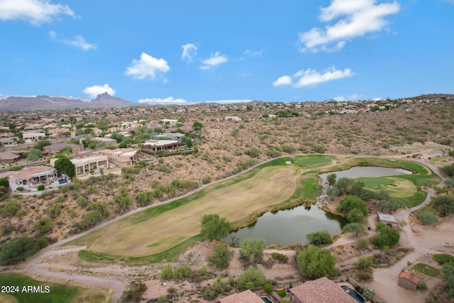 birds eye view of property featuring a water and mountain view