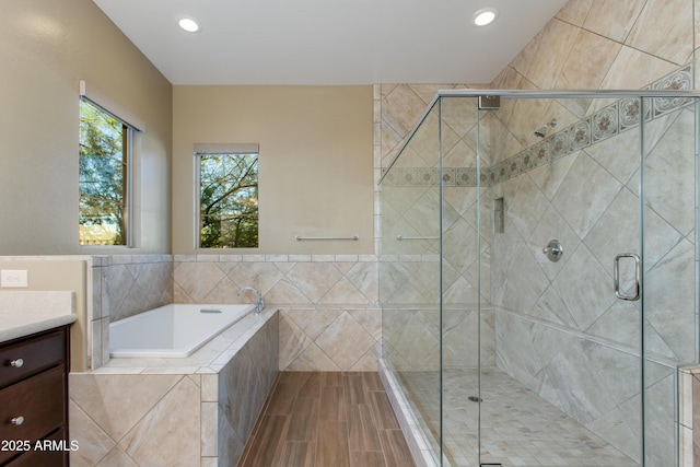 3285 Big Sky Dr, Wickenburg, AZ 85390 - bathroom featuring vanity, a garden tub, a shower stall, and recessed lighting