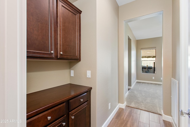 3285 Big Sky Dr, Wickenburg, AZ 85390 - hallway featuring baseboards and light wood-style flooring
