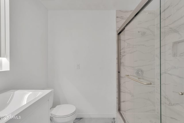 bathroom with toilet, vanity, baseboards, marble finish floor, and a marble finish shower