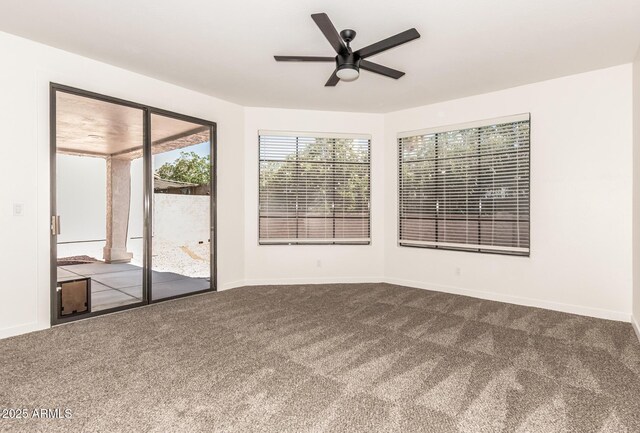 8725 E Via Del Arbor, Scottsdale, AZ 85258 - spare room featuring carpet and ceiling fan