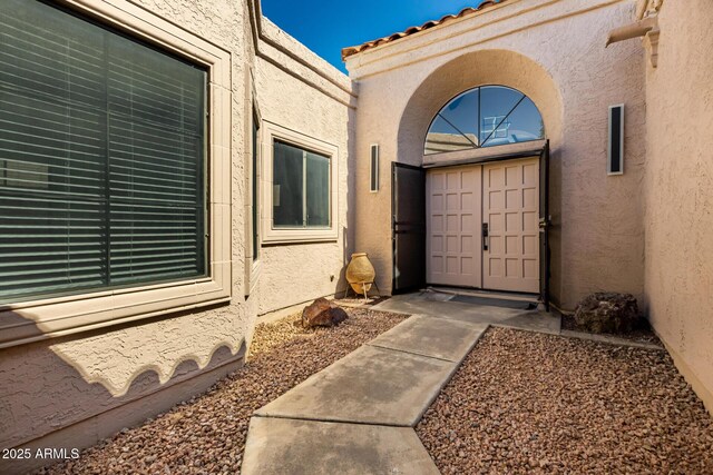 8725 E Via Del Arbor, Scottsdale, AZ 85258 - property entrance featuring stucco siding
