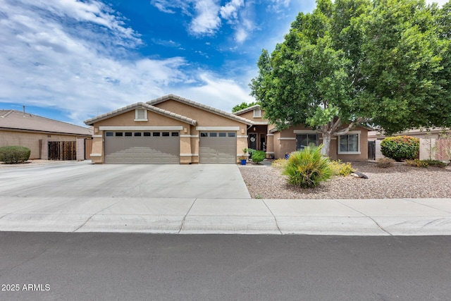 8738 W Runion Dr, Peoria, AZ 85382 - ranch-style home featuring stucco siding, a garage, concrete driveway, and a tiled roof